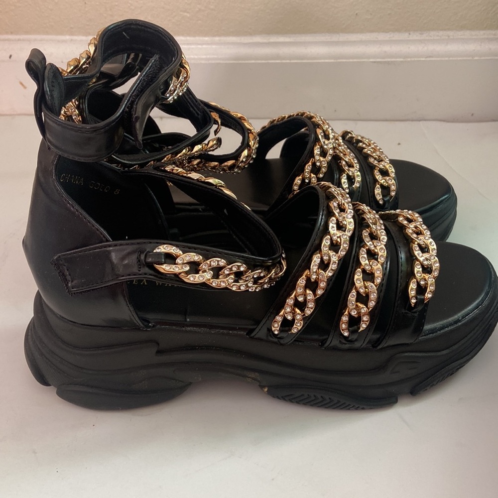 Azalea Wang black platform sandals with gold rhinestone chain